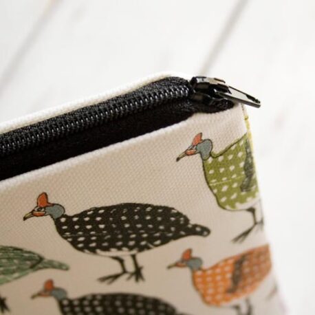 Guinea fowl make up bag zip detail